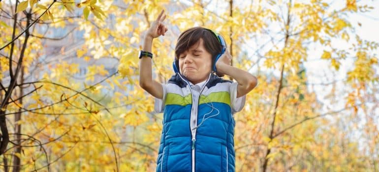 A boy enjoying music