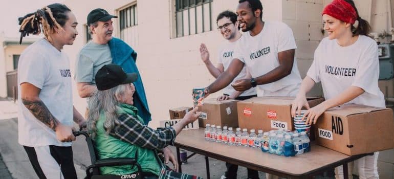 volunteers handing out giveaways 