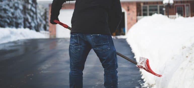 a man shoveling snow 