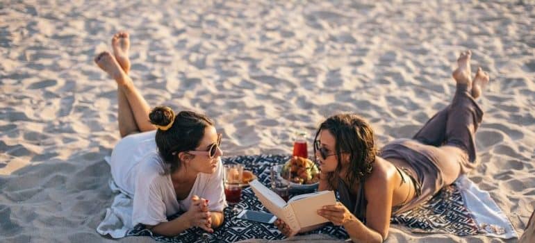 Women talking in the beach