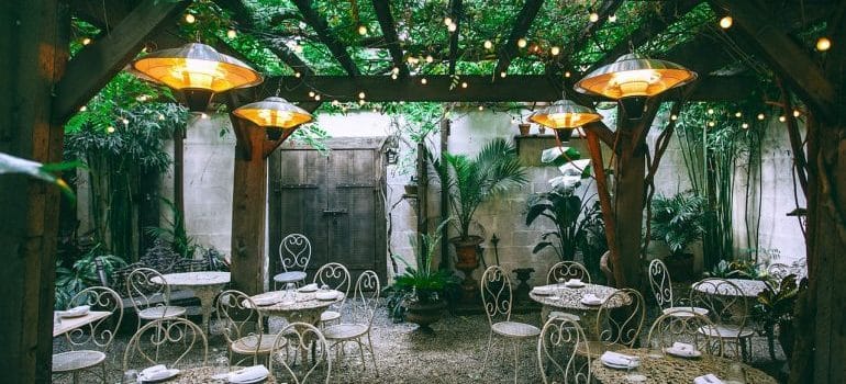 restaurant and garden with tables and chairs