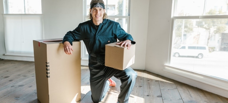 A professional mover with boxes