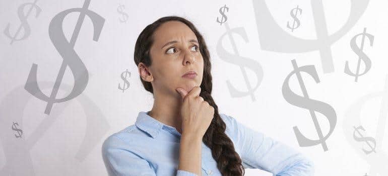 a woman thinking about money