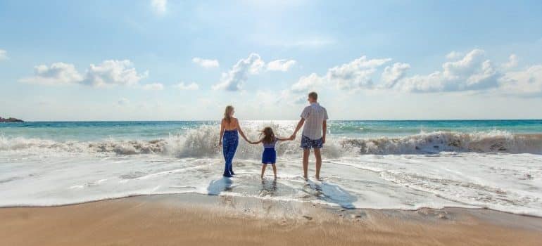 a family on a beach 