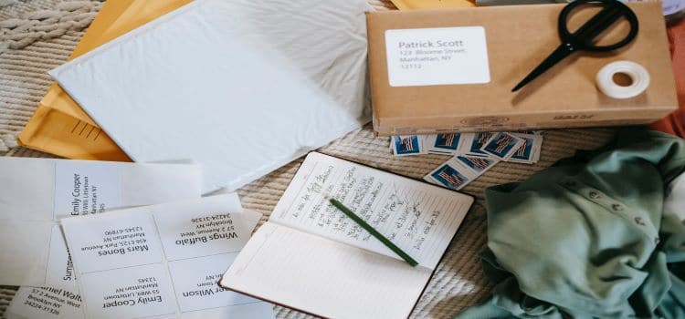 a box and a notebook with notes