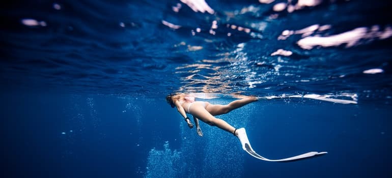 Girl swimming in the sea