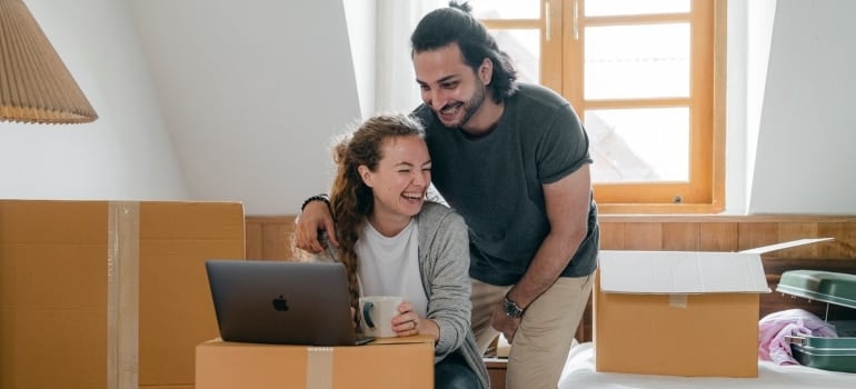 A couple searching for ways to prevent damage to your piano when moving in Homestead