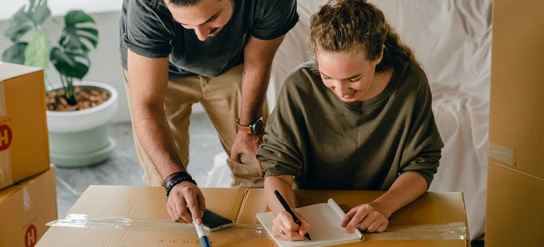 a couple making a checklist