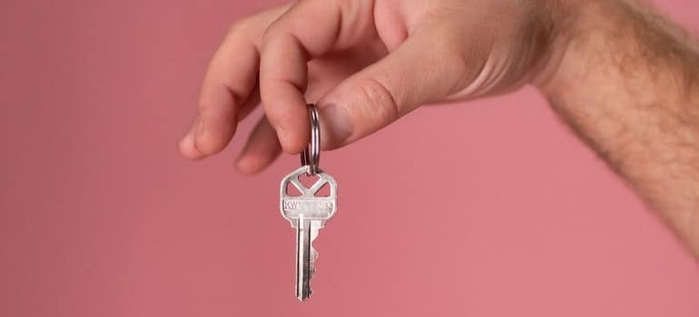 Person holding a key