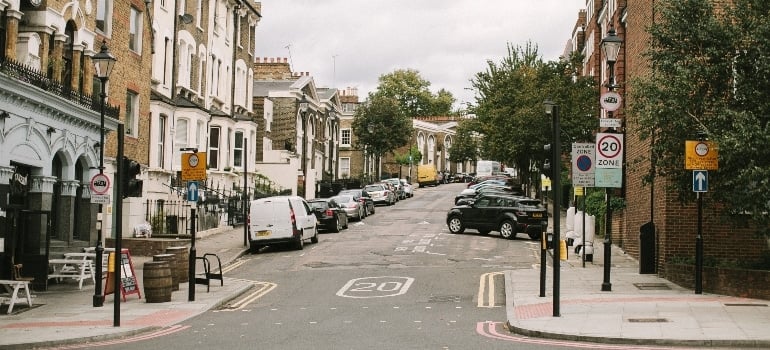 A street with cars. Moving to Homestead is a great decision if you have a family. 