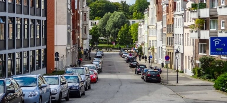 a street with cars parked on side