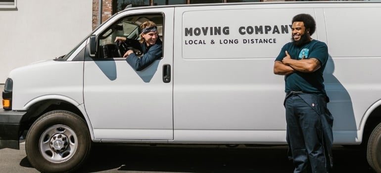 man in front of a moving truck