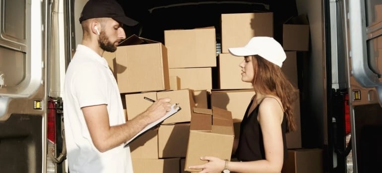 a man and a woman packing