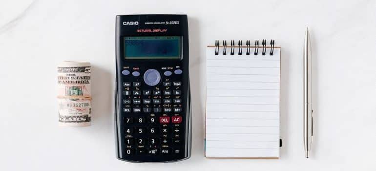 Calc and a notebook needed to calculate the average cost of moving to another state
