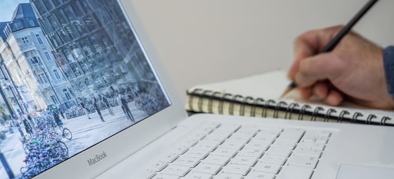 Macbook and a notebook 