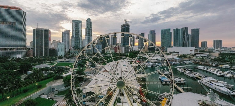 Ferris Wheel Near City Buildings