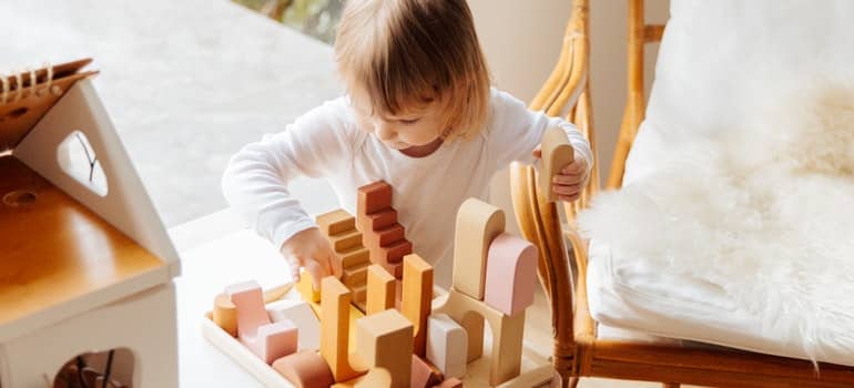 A toddler playing with toys