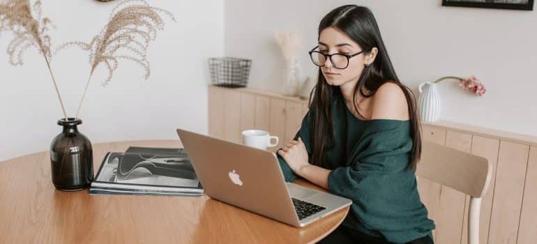 a woman researching about living and working in Marathon