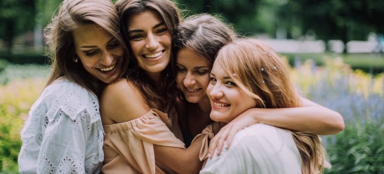 Friends seeing each other again after staying in touch after a long distance move to Coral Springs