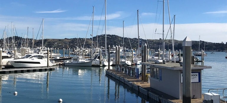 Yacht and Sail Boats Near Boardwalk.