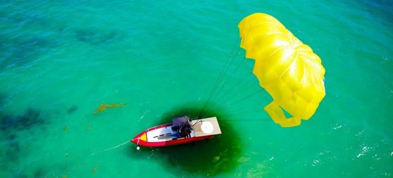 parasailing is one of the fun things to see and do in Fort Lauderdale after moving