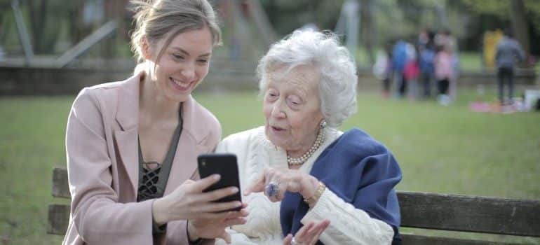 two women sitting on the bench