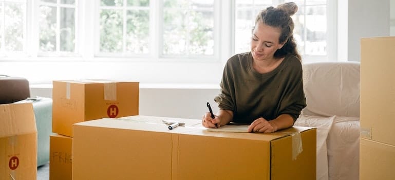 girl and boxes