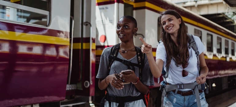 girls looking person talking about things to know about Coconut Grove before relocating