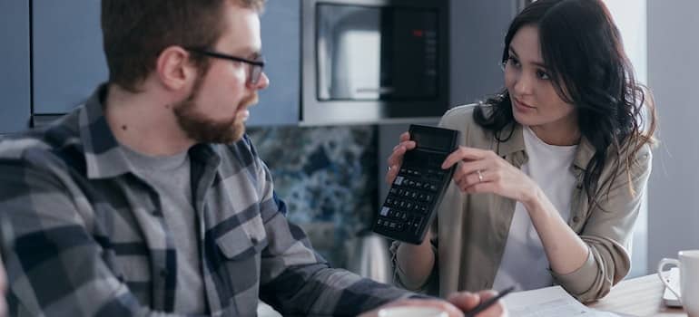 A couple calculating budget