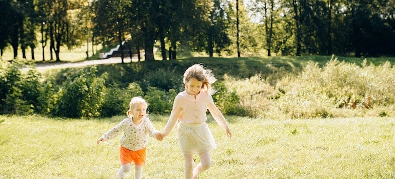 Two girls playing in a park
