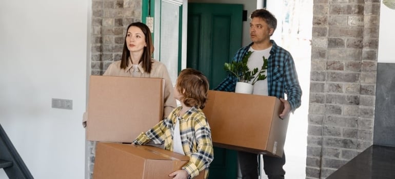 a family moving in a house