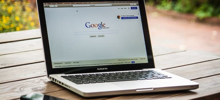 A laptop with an open page of google search on it;