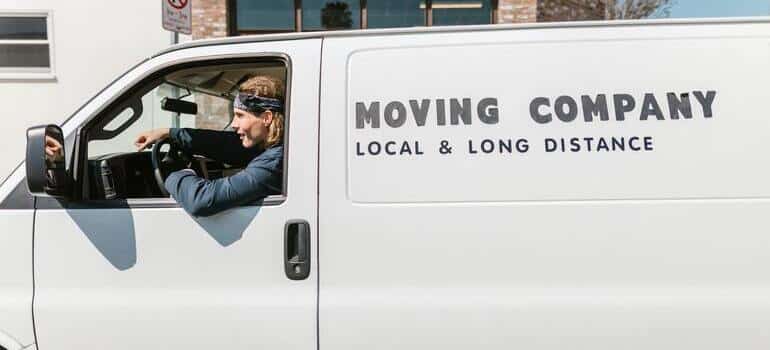 man sitting in white van