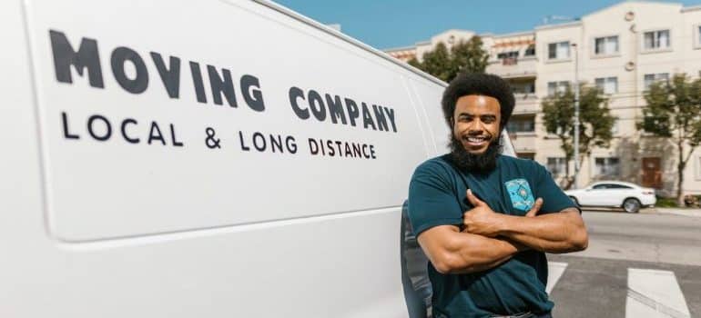 A man next to a moving van