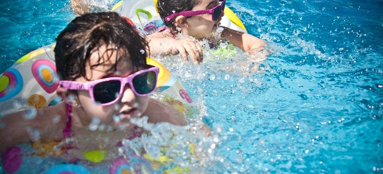 Kids swimming in the pool