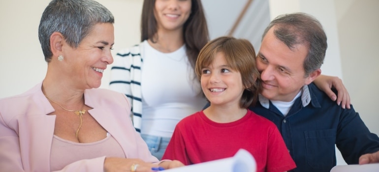 Picture of a family buying an old house in Surfside