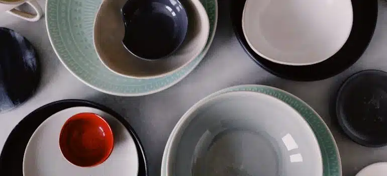 Stacks of bowls before owners pack and unpack porcelain