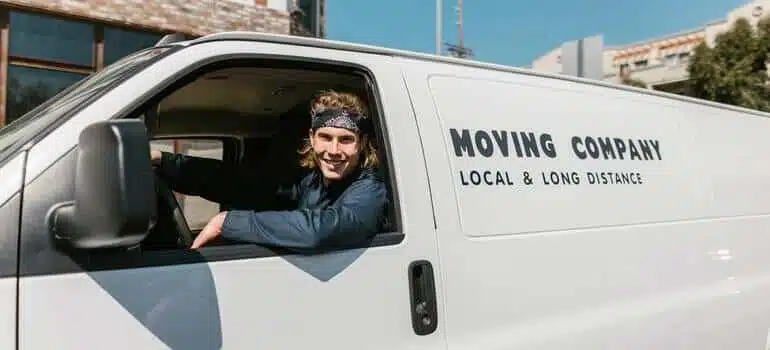 a man sitting in a white van