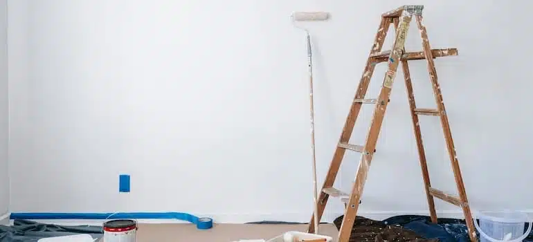 Renovating equipment lying against a wall.