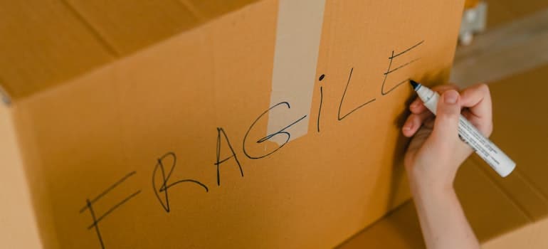 person labeling box