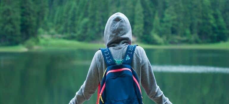 A person looking at a lake