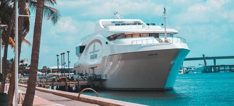 yacht parked near city