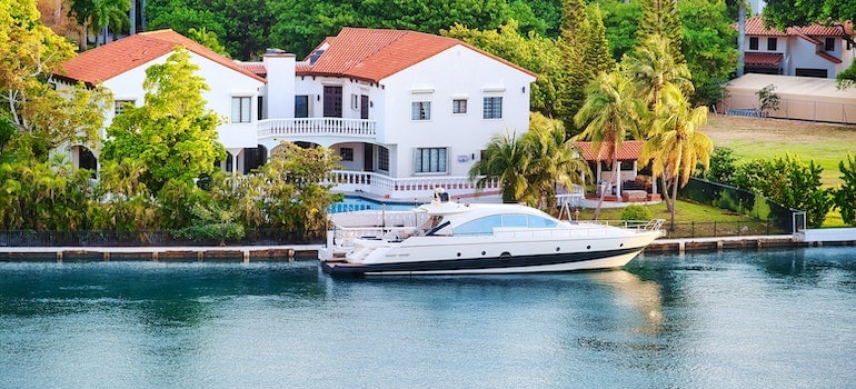 A luxurious villa and a yacht;