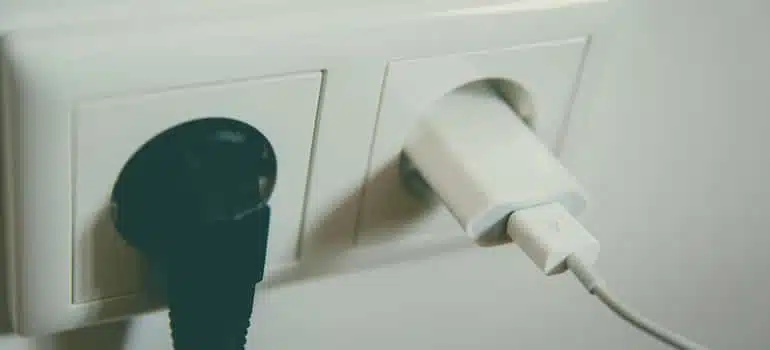 Black and white electric plug which should be disconnected in order to simplify a military move out of Florida