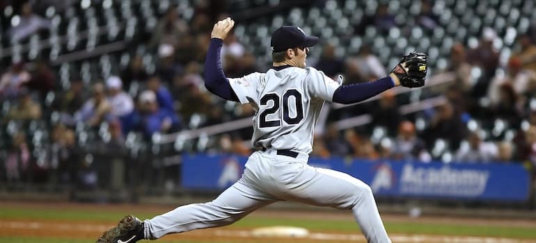 A baseball pitcher about to throw his ball.