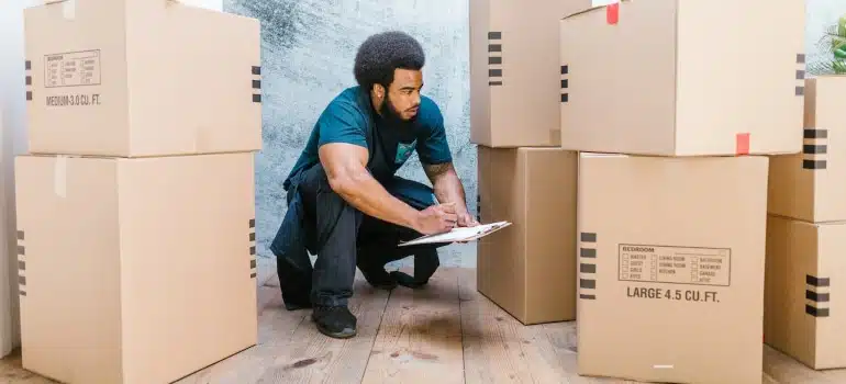 mover trying to help protect your hardwood floor when moving furniture