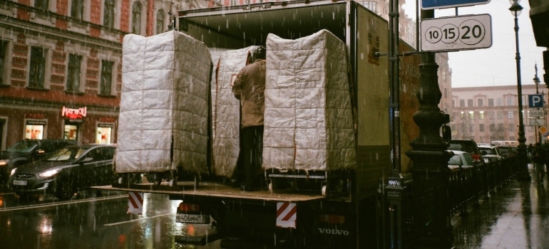 people loading a moving truck