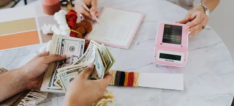 people calculating how to live in Miami on a smaller budget