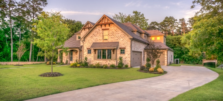 a brick house with a lawn