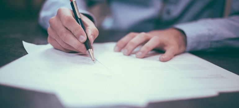 Man writing on paper